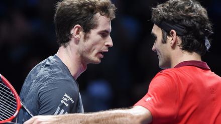 In Andy Murray (links) und Roger Federer treffen am Freitag zwei Publikumslieblinge in Wimbledon aufeinander. 