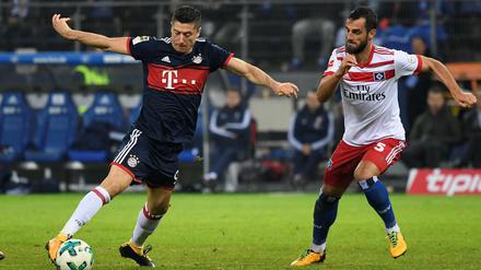 Die Bayern mit Robert Lewandowski (links) hatten Mühe gegen den HSV.