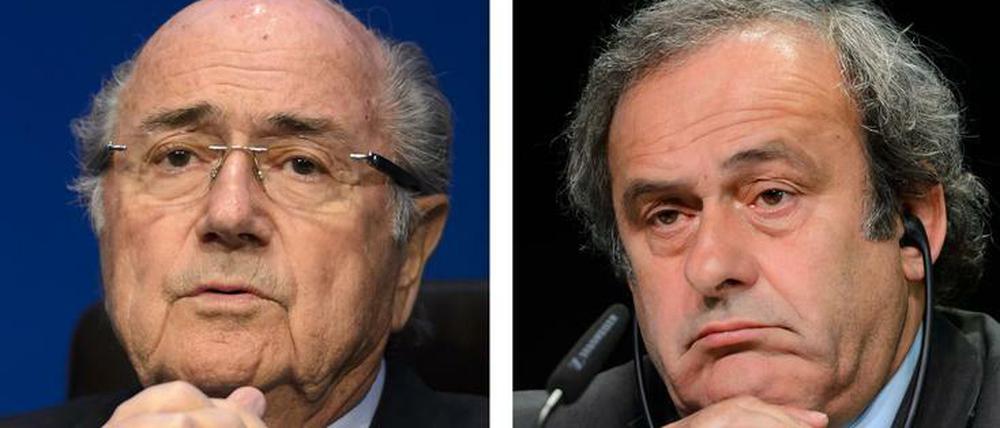 Da hilft wohl alles Flehen nicht. Für Sepp Blatter (l.) und Michel Platini wird es immer enger.