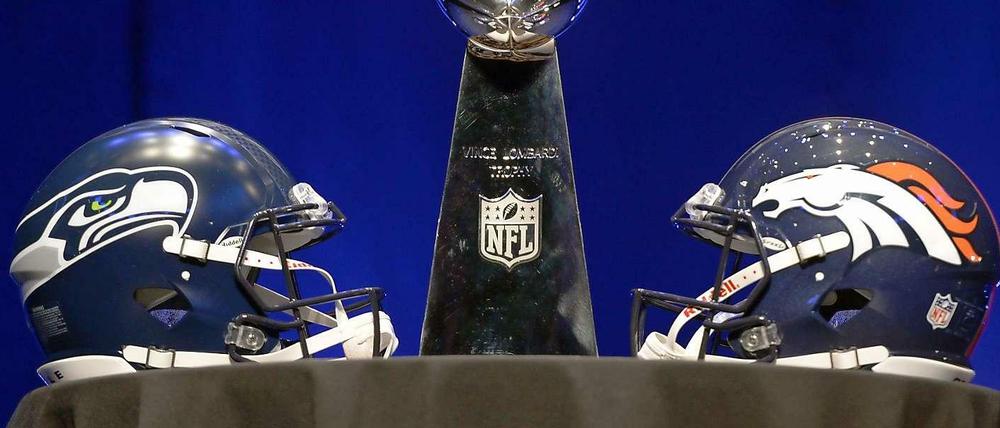 Duell um die Vince-Lombardi-Trophäe. Die Seattle Seahawks (l.) spielen im Super Bowl gegen die Denver Broncos.