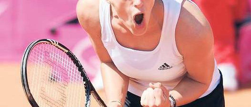 Die Spannung fällt ab. Andrea Petkovic konnte die Französin Pauline Parmentier im ersten Fed-Cup-Einzel mit 6:3 und 6:2 deutlich bezwingen. Foto: dpa