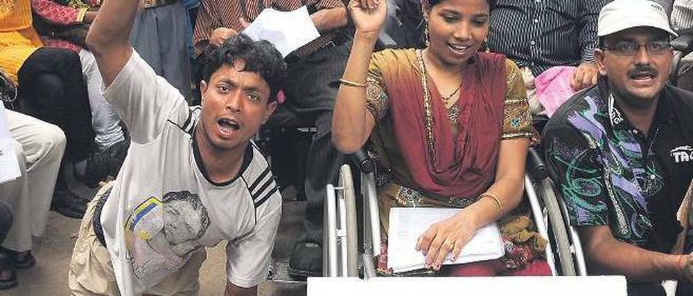 Laute Welle. Behinderte indische Athleten protestieren vor dem Ministerium. Foto: AFP