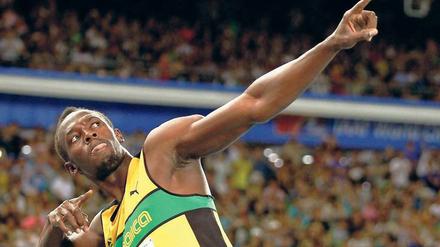 Der Showman. Superstar Usain Bolt in bekannter Pose. Foto: dpa