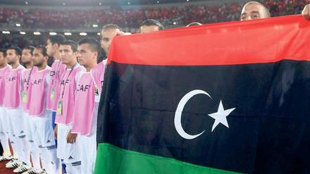 Flagge zeigen. Libyens Nationalspieler vor ihrem Eröffnungsspiel beim Afrika-Cup gegen Äquatorialguinea. 