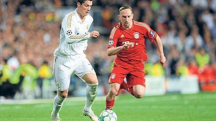 Wer ist die größere Bestie? 2012 warf Bayern um Franck Ribéry (r.) Cristiano Ronaldo und Real Madrid im Halbfinale aus der Champions League.