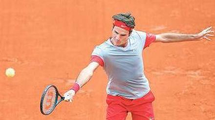 Entspannt auf dem Platz: Roger Federer kämpft weniger mit sich selbst als die Favoriten und hat nun auch noch sein vergrößertes Familienglück im Rücken. Foto: dpa