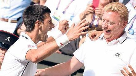 Spiel-, Satz- und Sieggemeinschaft. Novak Djokovic (l.) und Boris Becker haben allen Grund, sich gleich in die Arme zu fallen. 