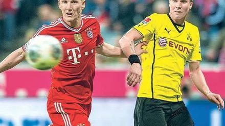 Schluss mit lustig. Die Nationalspieler Bastian Schweinsteiger (l.) und Kevin Großkreutz treffen am Mittwoch als Münchner und Dortmunder wieder als Gegner aufeinander.