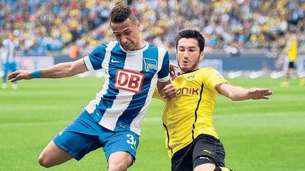 Es war einmal. Gegen Dortmund hat Hany Mukhtar (li., mit Milos Jojic) sein letztes Bundesliga-Spiel für Hertha bestritten. Das war im Mai 2014.