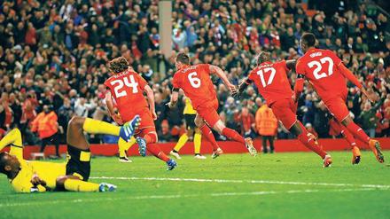 Entrückt. Liverpools Spieler werden am Donnerstagabend von einer Welle der Emotionen mitgerissen. 