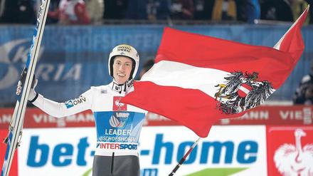 Damals war’s. Thomas Diethart gewann 2014 die Springen in Garmisch-Partenkirchen und Bischofshofen – und die gesamte Tournee. Foto: Georg Hochmuth/dpa