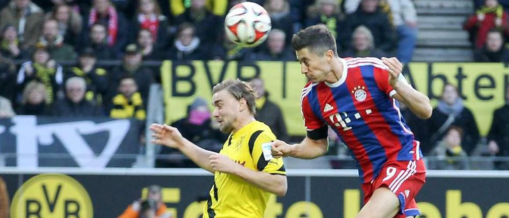 In der Vorsaison gewann der FC Bayern beide Bundesliga-Spiele gegen den BVB. Hier trifft Robert Lewandowski zum 1:0-Siegtreffer in Dortmund.