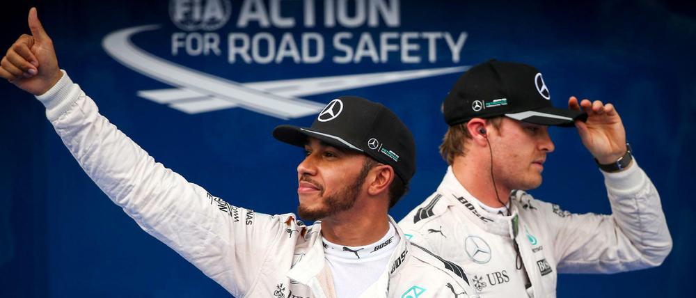 Lewis Hamilton (links) fuhr in Sepang die besten Trainingsrunden, deutlich vor Nico Rosberg.