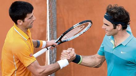 Auf gute Zusammenarbeit. Novak Djokovic und Roger Federer sind noch längst nicht fertig.