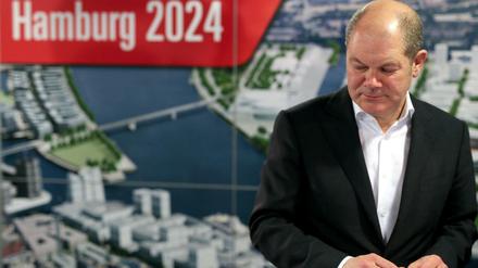Es hat nicht gereicht. Hamburgs Bürgermeister Olaf Scholz (SPD) nimmt am Sonntagabend in Hamburg das Ergebnis des Referendums über die Olympiabewerbung 2024 zur Kenntnis. 
