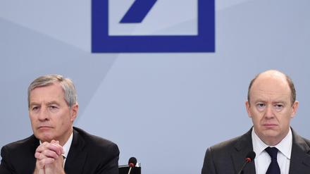 Was die Deutsche Bank ihren Chefs zahlt: 3,8 Millionen Euro für Jürgen Fitschen (links), 1,9 Millionen Euro für John Cryan.