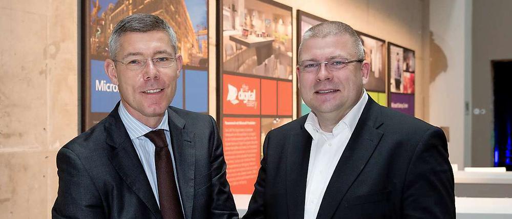 Investieren in Berlin. Microsoft-Deutschland-Chef Christian Illek (l.) und Henrik Tesch, Niederlassungsleiter für Microsoft Berlin, planen die Eröffnung des Centers im September.