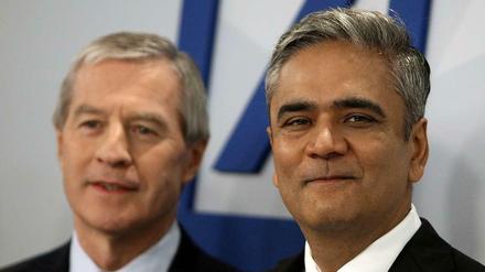 Haben gut lachen: Die Vorstandsvorsitzenden der Deutschen Bank Jürgen Fitschen (links) und Anshu Jain
