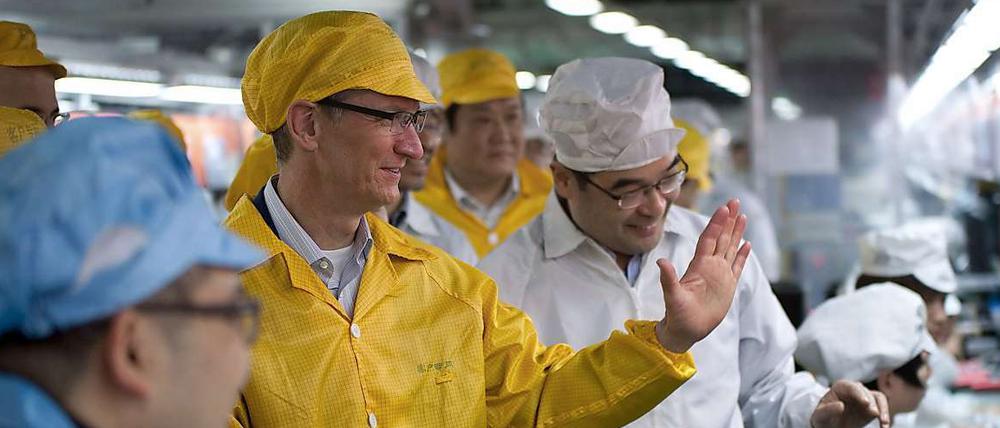 Apple-Chef Tim Cook hat das chinesische Foxconn-Werk, das jetzt wegen Arbeiterunruhen Schlagzeilen macht, im März besucht.