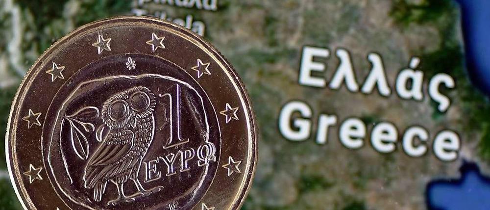 Euro und Eule. Für die Griechen entscheidet sich in den kommenden Wochen, ob sie in der Währungsunion bleiben.