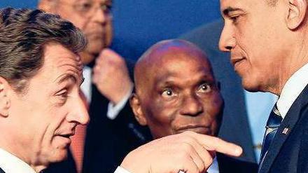 Hilfreich. Der Gipfel war für Frankreichs Präsident Sarkozy (l.) und US-Präsident Obama (r.) auch eine Gelegenheit, um von ihren schlechten Umfragewerten abzulenken. 