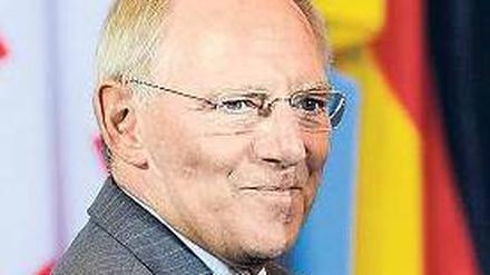 Wortlos glücklich. Bundesfinanzminister Wolfgang Schäuble (CDU). Foto: dpa