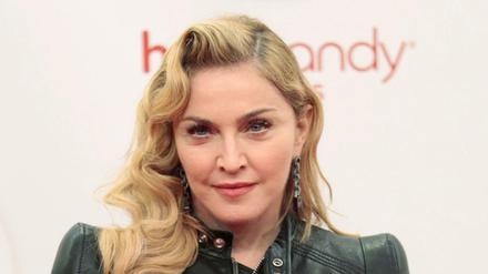 Patin der Fitnesskette: Popstar Madonna kam zur Einweihung des Studios an der Truman Plaza.
