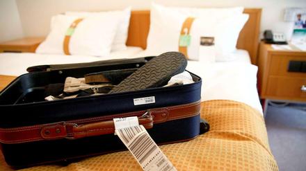 Geschäftsmann oder Urlauber? Seit dem Jahresbeginn müssen Hoteliers privaten Gästen eine Steuer in Höhe von fünf Prozent des Übernachtungspreises in Rechnung stellen.