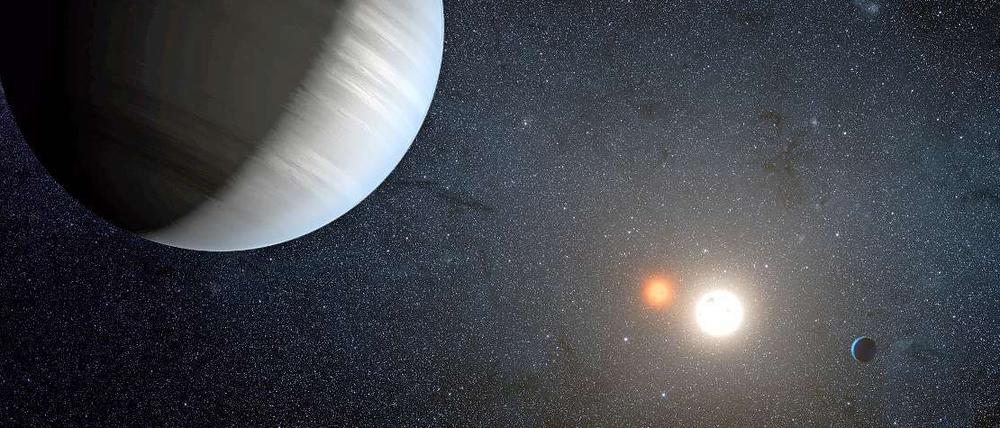 So stellen sich die Astronomen das Doppelsternsystem "Kepler-47" mit den beiden Planeten vor. 