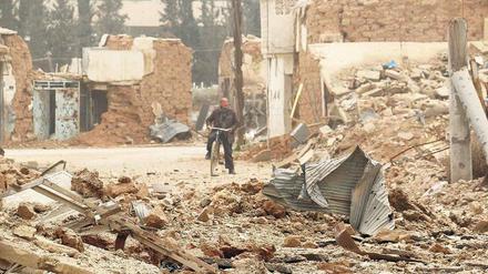 Aleppo nach einem Bombenangriff. Seit Beginn des blutigen Bürgerkriegs, den die Truppen von Präsident Baschar al-Assad gegen verschiedene Oppositionsgruppen führen, ist in Syrien das zivile Leben zum Erliegen gekommen. 