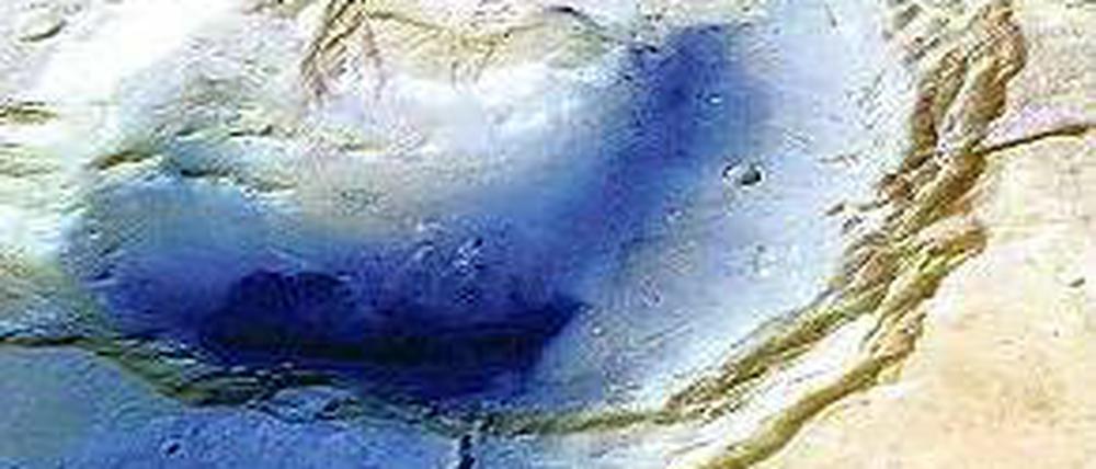 Explodiert. Ein gewaltiger Ausbruch formte diesen Krater auf dem Mars. Die Aufnahme entstand mit Hilfe der Marssonde HRSC, die unter anderem von Berliner Forschern entwickelt wurde. 