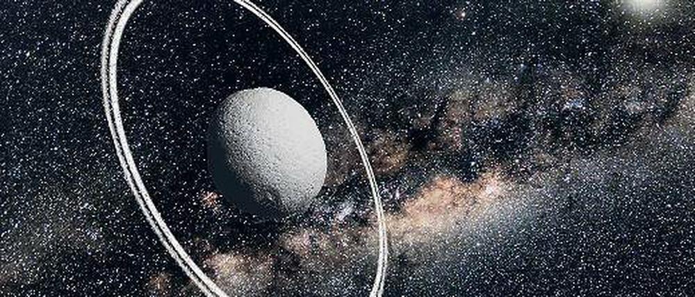 Überraschend. Den kleinen Asteroiden namens Chariklo umgibt ein Ringsystem aus Eis und Gestein (hier eine künstlerische Darstellung). Bisher wurden solche Ringe nur Planeten wie dem Saturn zugeschrieben. 