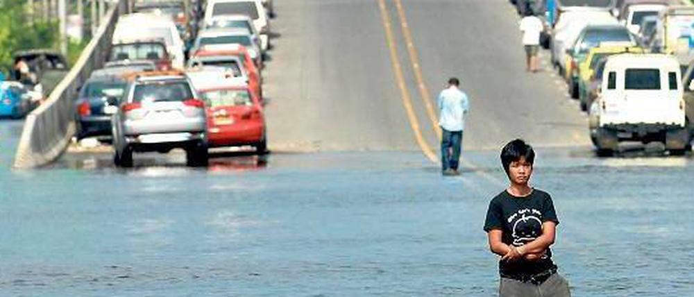 Überschwemmt. Städte, die an Höhe verlieren, sind anfälliger für Hochwasser. Das zeigt sich beispielsweise in Bangkok. 