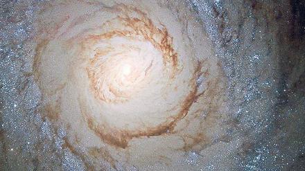 Sternenstrudel. Die Galaxie Messier 94 im Sternbild Jagdhunde, aufgenommen vom Weltraumteleskop "Hubble".
