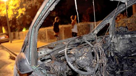 Ein ausgebranntes Auto, aufgenommen am 18.8.2011 in Berlin.