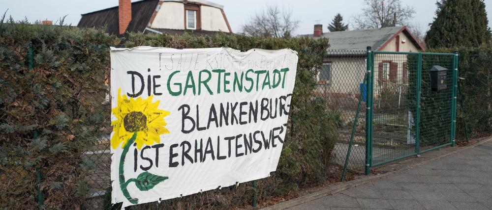 Protestplakat gegen das Neubauprojekt Blankenburger Süden. 