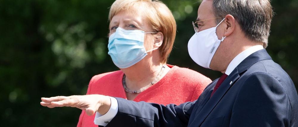 Nicht auf einer Wellenlänge: CDU-Chef Armin Laschet und Kanzlerin Angela Merkel. 