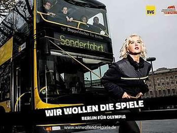 Kess? Eine Frau zieht einen Bus - so wirbt die BVG für Olympia in Berlin.