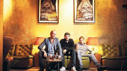 Mit Konzept. Fotograf Sascha Kramer, Clubgröße Cookie und Marcus Trojan vom Weekend haben die Bar in der Torstraße gemeinsam eröffnet (von links).