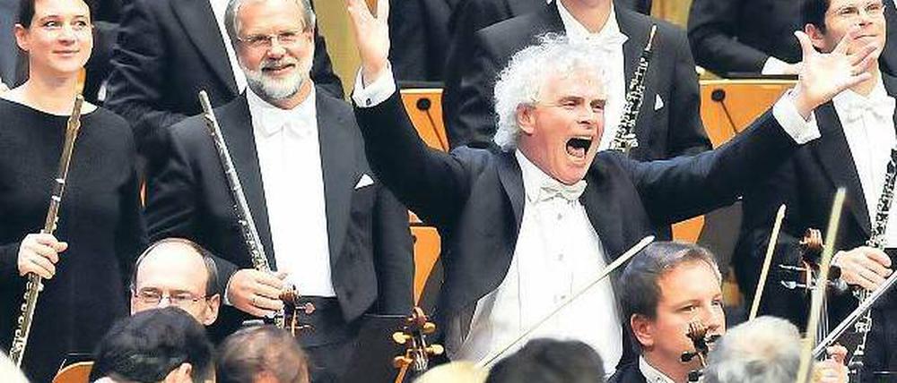 Kostenpflichtig. Simon Rattle und die Berliner Philharmoniker. Foto: dpa