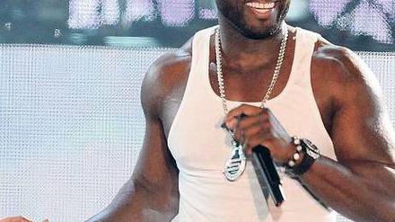 Mann mit Muckis. Rapper 50 Cent hat einen neuen Film im Verkauf. Foto: AFP