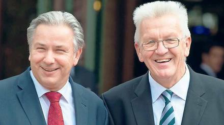 Geber und Nehmer. Winfried Kretschmann (rechts) ist seit 2011 Ministerpräsident von Baden-Württemberg. 