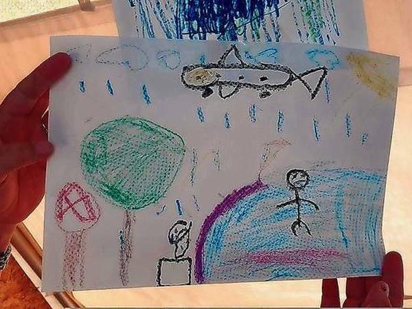 Erlebnisse therapeutisch verarbeiten. Ein Flüchtlingskind zeichnete das Bild, es zeigt Bombenabwürfe. 