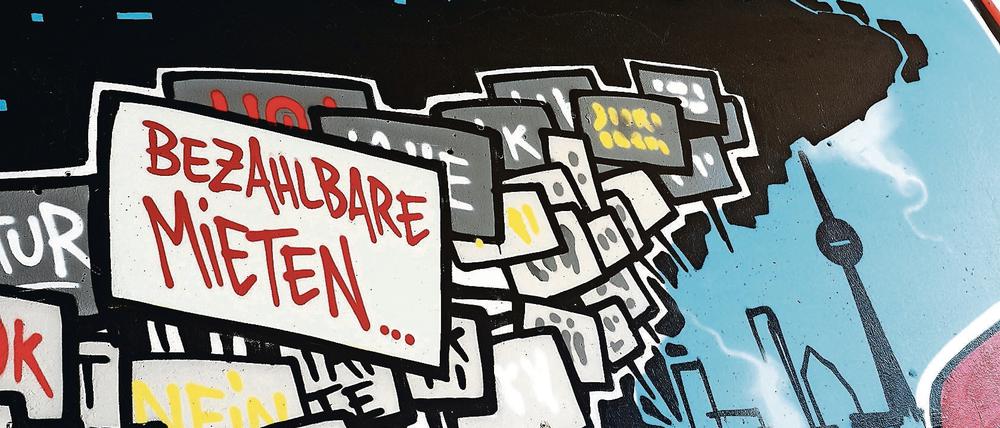 Ein Graffiti am Kottbusser Tor in Berlin fordert bezahlbare Mieten.