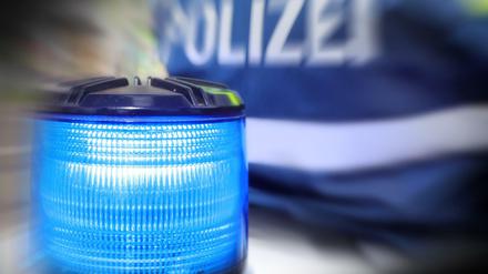 Polizei mit Blaulicht (Symbolbild).