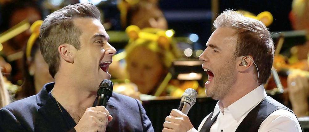 Wiedervereinigt: Robbie Williams und Gary Barlow gehen wieder mit Take That auf Tour. Berliner Fans müssen nach Düsseldorf, Hamburg und/oder München reisen.