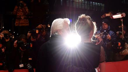 US actor Richard Gere and Alejandra Silva pose as they arrive on the red carpet for the premiere of the film "The Dinner" in competition during the 67th Berlinale film festival in Berlin on February 10, 2017. / AFP PHOTO / Tobias SCHWARZ