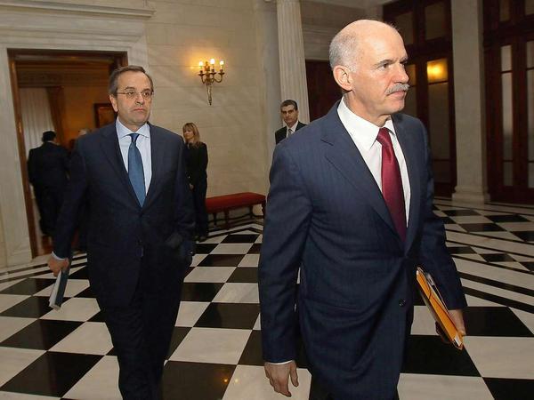 Verpflichteten sich zu Reformen: Giorgos Papandreou (vorn) und Antonis Samaras.