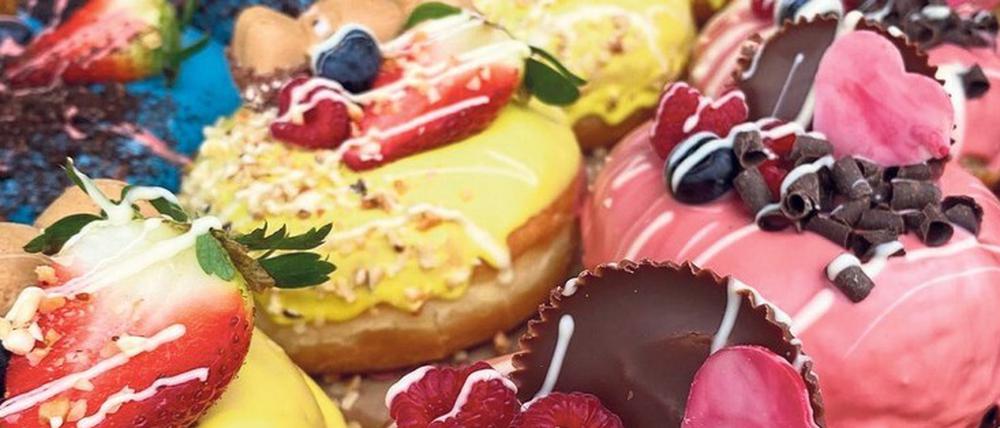 Schön bunt - die „Royal Balls“, gefüllte Pfannkuchen, von Royal Donuts.