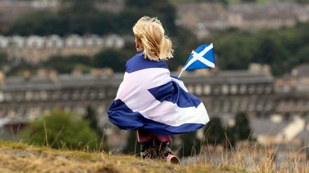 Blau-weißer Stolz: Ein Kind, in eine schottische Flagge gehüllt, bei einer Demonstration für die schottische Unabhängigkeit.
